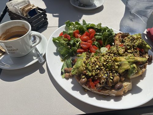 Vegan avocado toast, with salad and coffee.    at Bar Centro in Toscana