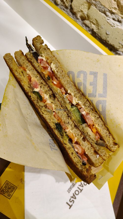 Toast with hummus, grilled eggplant, grilled zucchini, tomatoes and vegan mayo. So good! at Capatoast - Bolzano in Trentino-alto Adige