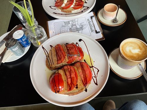 Sandwich with Pesto, Tofu and tomatoes and flat white at Café Schublade in Ulm
