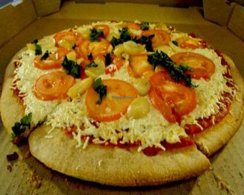 12 inch vegan pizza with daiya, tomato, basil and fresh garlic at Whole Foods Market - Las Vegas Blvd in Las Vegas