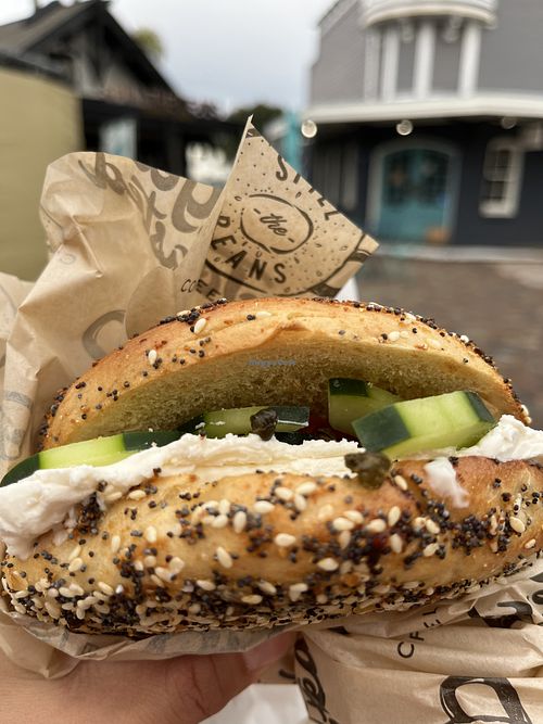 Bagel with vegan cream cheese and veg  at Spill the Beans in San Diego
