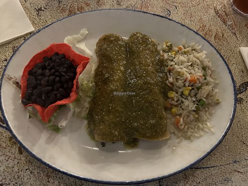 Veggie enchiladas with white rice, black beans, and no cheese.   at Barra Barra Saloon in San Diego