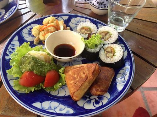lunch plate with vegan sushi and samosa at Ploughman's Garden in Ho Chi Minh City