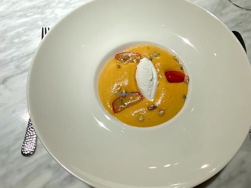 Poached peach with coconut ice-cream at Risette in Valletta