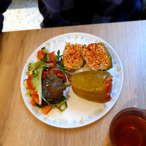 Dolma/Gemista Plate Green bell peppers filled with rice, served with  salad at Roka in Leiden