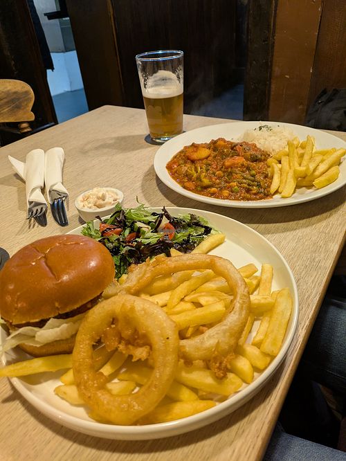 Oriental burger and veg curry with half and half at The Triangle Inn in Wales