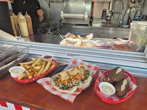 Vegn fries, Vegan masala curry loaded flatbread, vegan pretzel sticks. at Grub Club in Queenstown