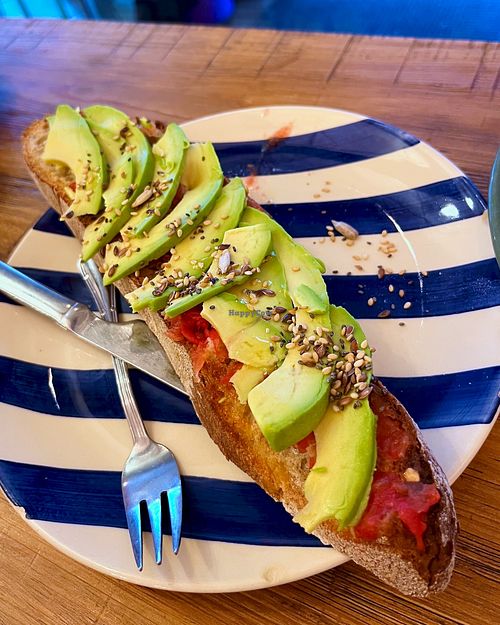 Vegan toast with tomatoes, garlic, avocado, olive oil and seeds at Panadería Morales, S.L. in Pontevedra