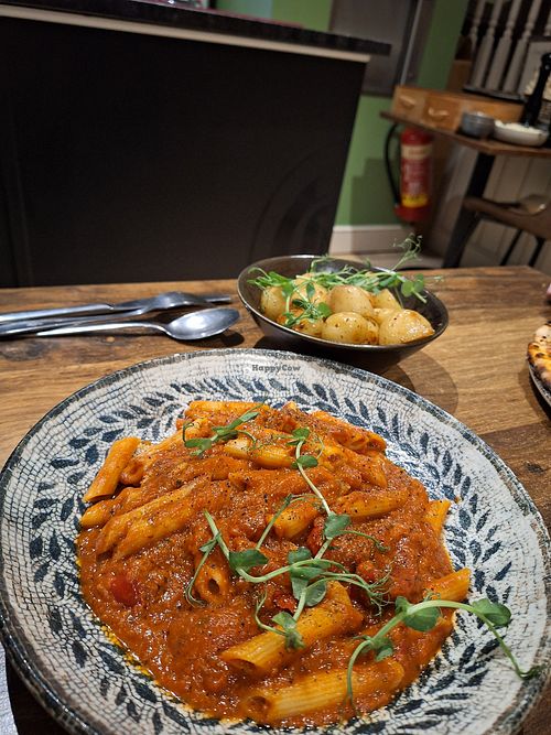 Penne Arrabbiata and rosemary potatoes at Cosa Nostra in Whitby
