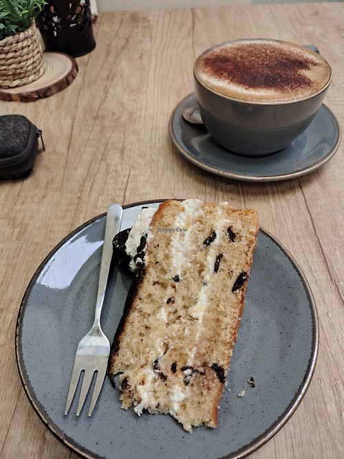 Vegan Oreo cake. Cappuccino with oat milk. at Coffee at the Wood in Birmingham