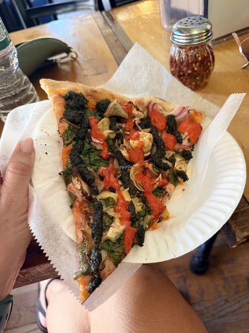The vegan city slice is incredible with so many flavors, including pesto   at The Oven's Slice in New York City
