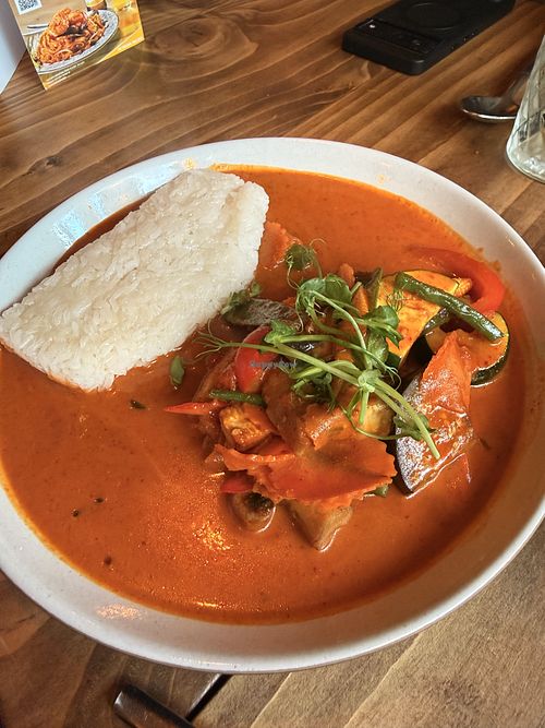 Red Thai curry with sticky rice, veg and fried tofu  at THAI BAAN Thai street food in Chester