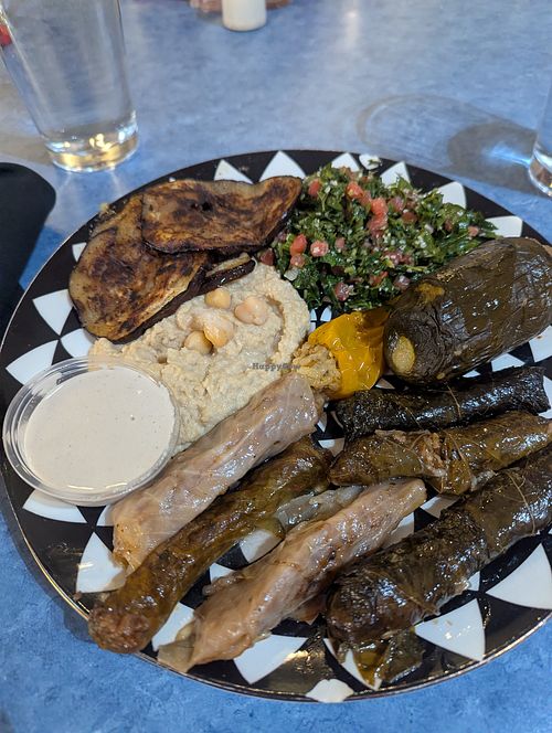 This is the vegan platter with eggplant instead of falafel. Delicious! at Bistro 55 - Mediterranean Restaurant in Flemington