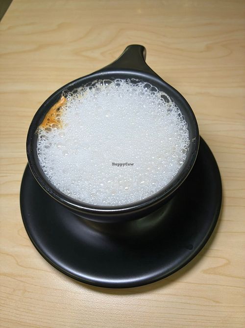 Almond milk cappuccino   at The Toasted Yolk Cafe in Mobile