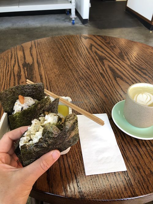 Plum kombu and spicy takana onigiri, houjicha latte with soy milk  at domo 39 in Inner West Council