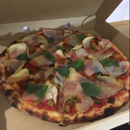 vegan pizza with added potato  at La Pizzateca in Madrid