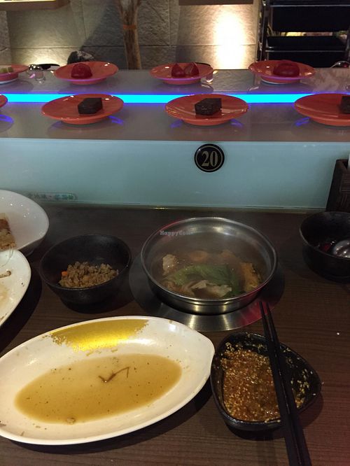 Sichuan Spicy Hot Pot base seen in Picture. They also have a Thai style Coconut milk base, Sweet Pumpkin base among others. at Shan Hai Zhuan in Taipei