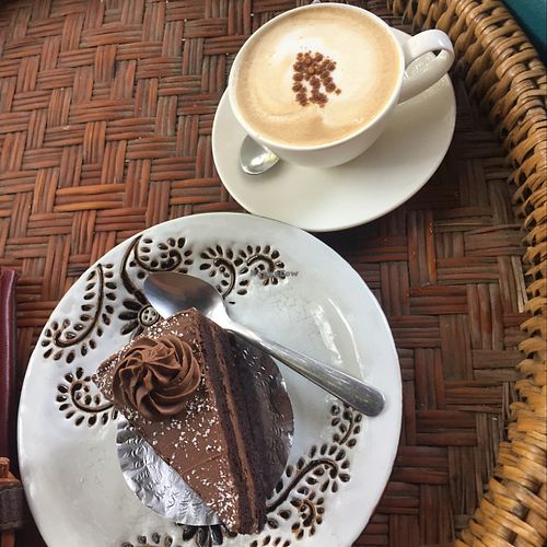Cappuccino and chocolate cake at Amrita Garden in Chiang Mai