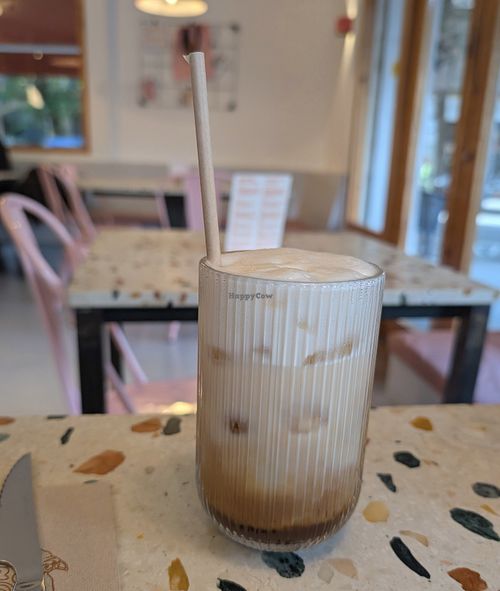 Coconut latte at Corgi Cafe | Arc de Triomf in Catalunya