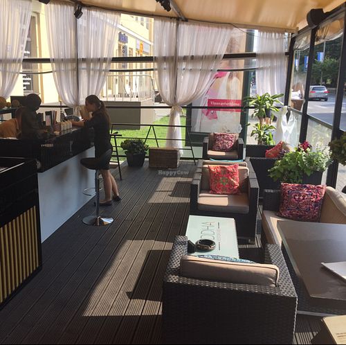 outside bar and seating at Buddha Restorans in Riga