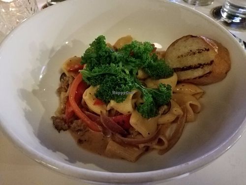 Rigatoni with vegan salsiccia, mushrooms, peppers, and kale. Made vegan using coconut cream instead of cajun cream (and no cheese). at Small Batch in St Louis