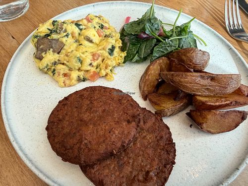 just egg scramble, sausage, potatoes, kale salad at Quail + Crane in San Francisco