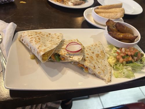Veggie quesadilla with vegan cheeze, yucca fries and plantains   at Tapas and Tequila in Blue Ridge