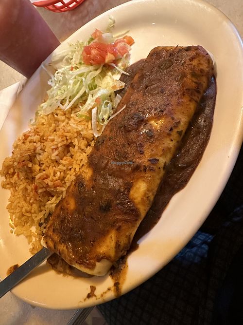 Bean burrito with ranchero saucee  at Chuy's in Denton
