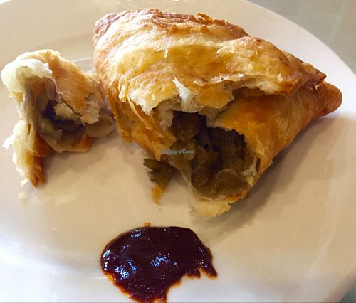Sambusa, a triangle puff pastry filled with green lentils  at Rahel's Vegan Cuisine in Los Angeles
