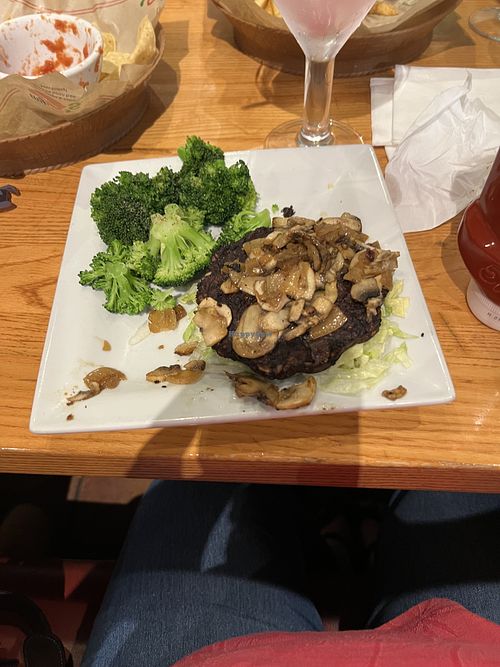 Mushroom burger with no cheese or mayo, and a black bean patty, with broccolii  at Chili's Grill & Bar in Dallas