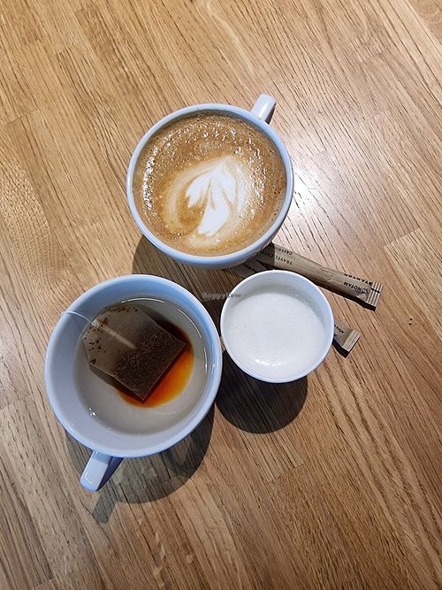 Almond milk cappuccino and tea with almond milk at POZ - Cavarious in Poznan