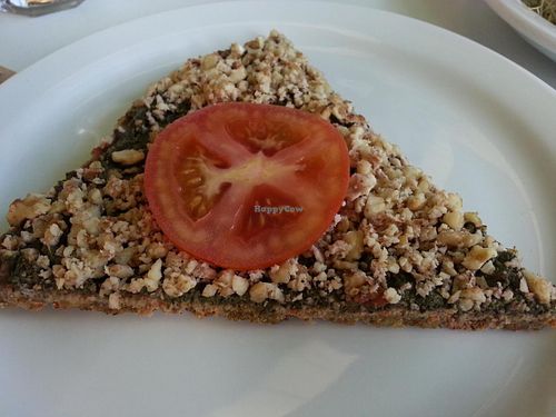 Raw pesto pizza at Gorilla Foods - Powell St in Vancouver