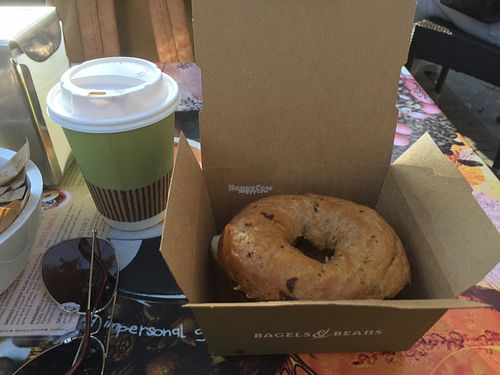 Vegan Cinnamon Raisin Bagel with Banana and Maple Syrup  at Bagels & Beans - De Clercqstraat in Amsterdam
