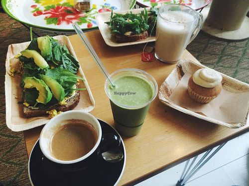 Tofu scramble sandwich, peanut smoothie, vanilla cupcake and brie sandwich.  at Vegabond - Leliegracht in Amsterdam