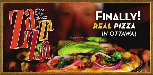 Homemade pizza topped with tons a fresh veggies at ZaZaZa in Ottawa