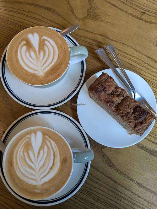 Oat milk flat whites and vegan banana bread at Capella Coffee Roaster Hanoi in Hanoi
