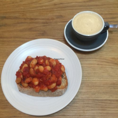 beans on toast, Cappuccino with soy milk for GBP7,5 at Kin Cafe Vegetarian in London