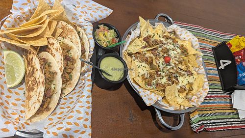 Veggie chilli quesadillas and veggie nachos. at ❤️TACOPOLIS 🇲🇽 in Florianopolis