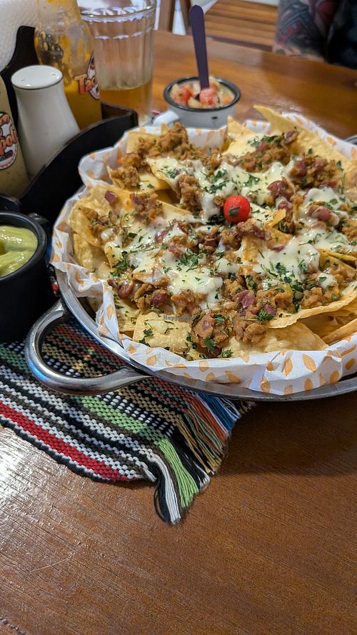 Veggie nachos with guacamole and vinaigrette at ❤️TACOPOLIS 🇲🇽 in Florianopolis