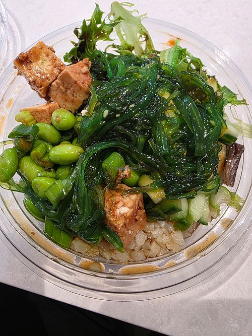 Build your own bowl with marinated tofu, seaweed, cucumber, edamame, rice, and mixed greens at Aloha Poke Co - Sterling Food Hall in Chicago