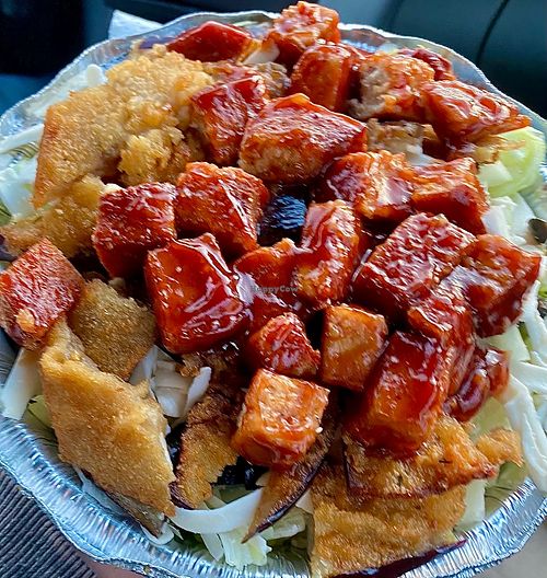 Vegan meat with fried eggplant, vegan cheese,  olives, onions, and sauce at Angelina's Apizza in Waterbury