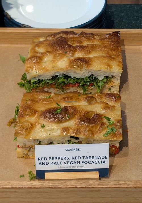 RED PEPPERS, RED TAPENADE AND KALE VEGAN FOCACCIA at Signorelli bakery - Wood Wharf in England