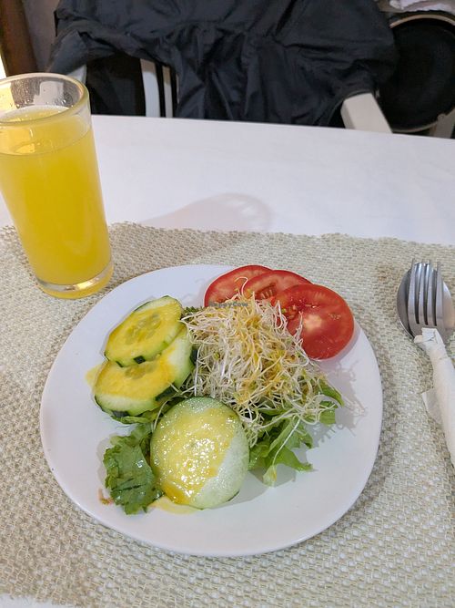 Fruit drink, and salad of the day at Comida Vegetariana in Mexico City