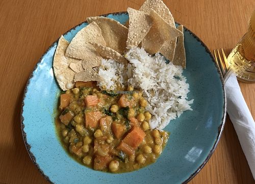 Chickpea curry with poppadom chips    at Tiffany's Restaurant in Weston-super-mare