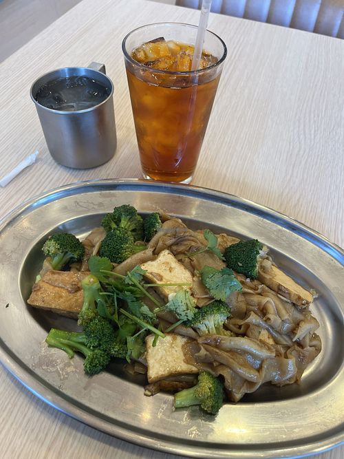 Pad See Ew + iced tea   at I am Thai Eatery in Vancouver