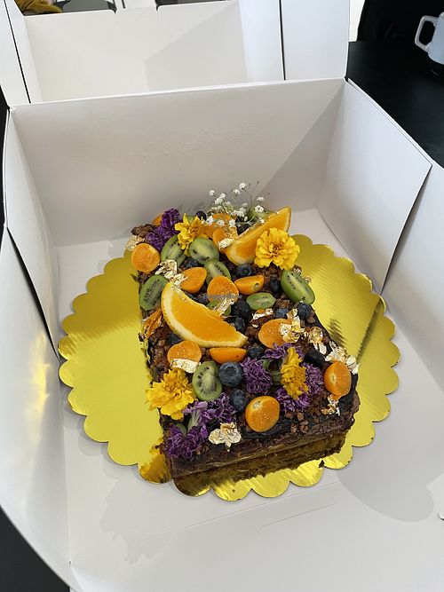 Pre-ordered vegan brownie cake  at Cakes & Friends Bakery in Copenhagen