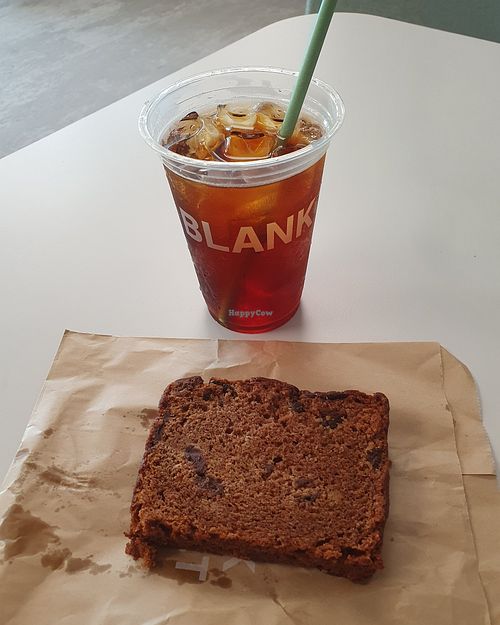Peach iced tea and banana bread at Blank Street Coffee in Manchester