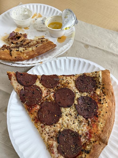 Vegan pepperoni slice (and vegan BBQ chicken in the background)  at Mikey's Late Night Slice - Dayton in Dayton