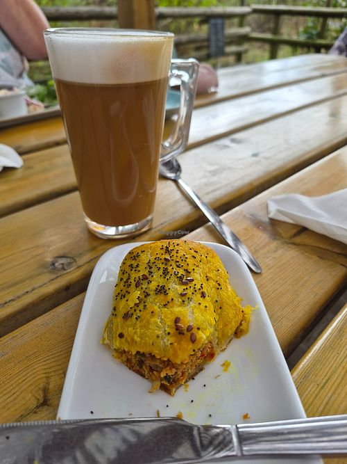 Vegan roll. Oat latte. at Heritage Cafe  in Leicester