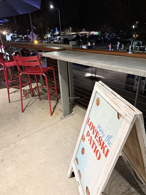 Patio seating for Loveski facing Napa River   at Loveski - Napa  in Napa